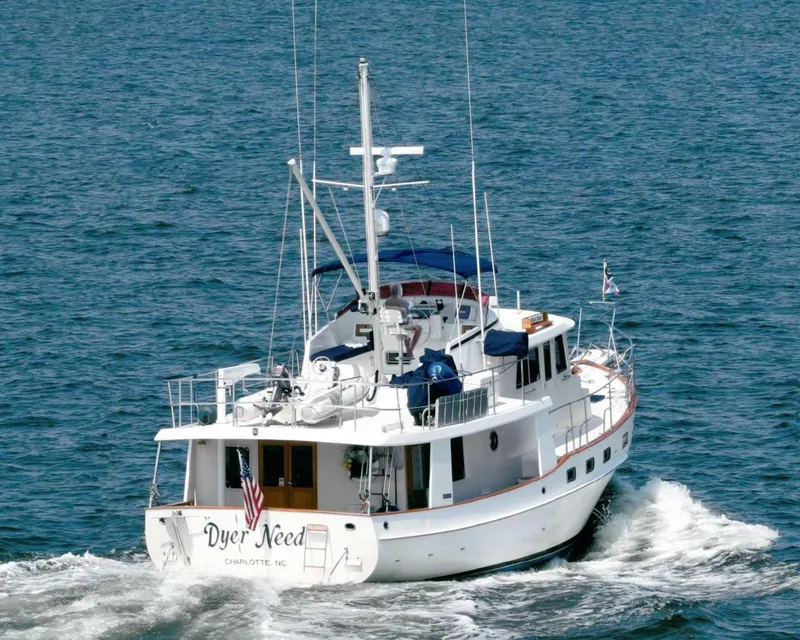 Slide: The Image of Kadey-Krogen 48 yacht from 1996 cruising on open water, rear view. - 8