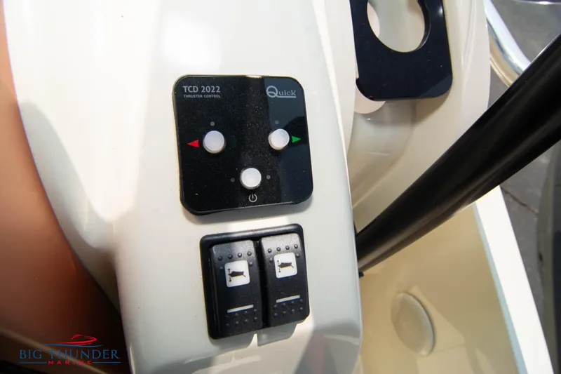 Slide: The Image of Control panel of 2024 Capoforte CX270 boat with buttons and switches. - 27