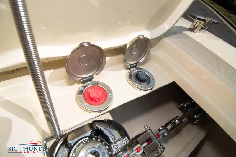Slide: The Image of 2024 Capoforte CX270 boat fuel and water caps with Big Thunder Marine logo. - 38