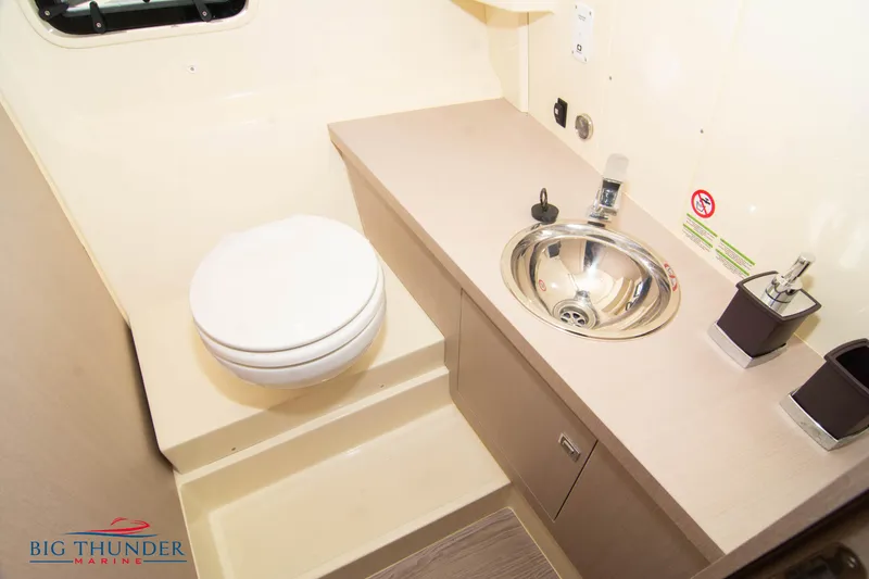 Slide: The Image of 2024 Capoforte CX270 boat bathroom with sink and toilet, featuring modern design. - 44