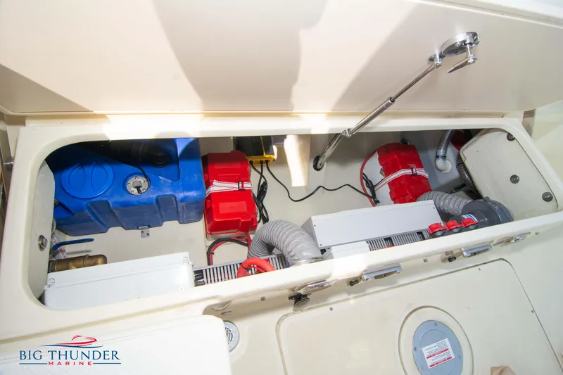 Slide: The Image of 2024 Capoforte CX270 engine compartment with visible components and wiring. - 47