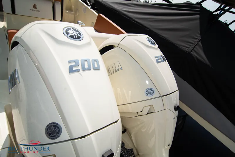 Slide: The Image of 2024 Capoforte CX270 with dual Yamaha 200 outboard engines. - 7
