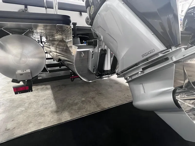 Slide: The Image of 2024 Harris Sunliner 230 pontoon boat engine and propeller detail. - 28