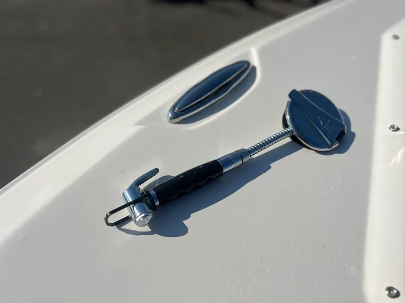 Slide: The Image of Sailfish 316 DC 2025 boat deck with chrome fittings and handle. - 25