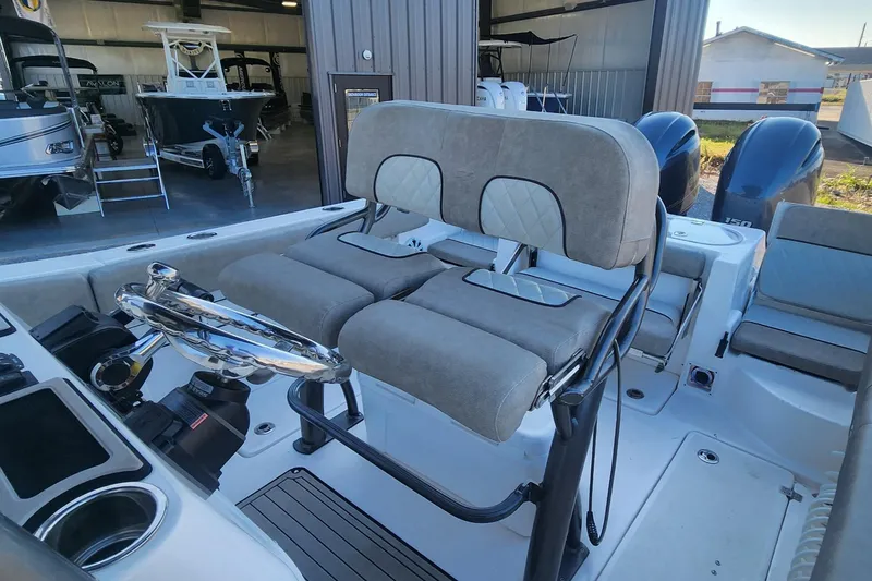 Slide: The Image of 2019 Sea Fox 266 Commander boat interior with dual seating and control panel. - 4
