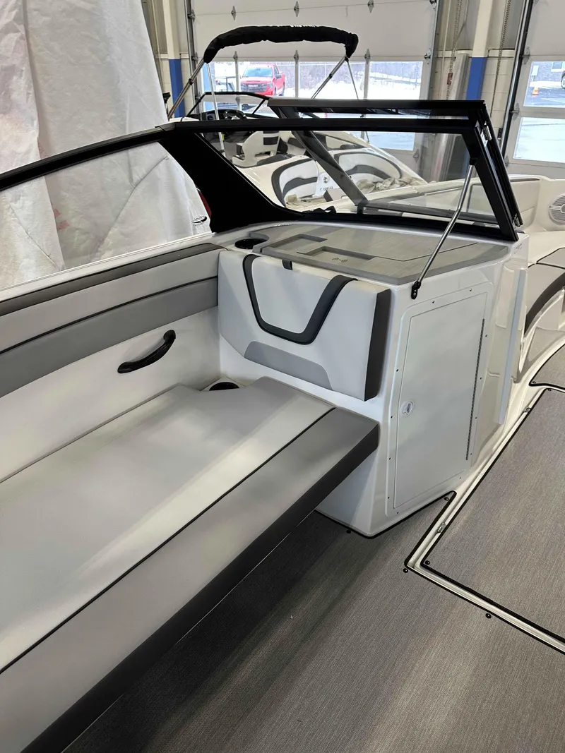 Slide: The Image of 2025 Yamaha Boats AR220 interior with sleek seating and modern design. - 7