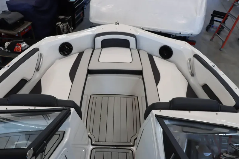 Slide: The Image of 2025 Yamaha Boats 195S interior with sleek seating and modern design. - 18