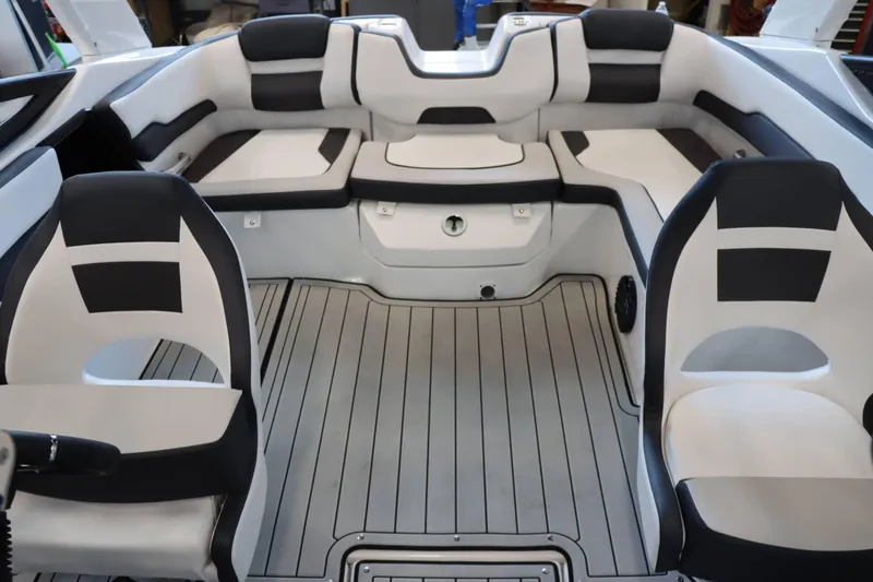 Slide: The Image of 2025 Yamaha Boats 195S interior with sleek seating and modern design. - 24