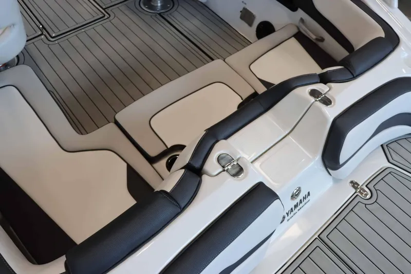 Slide: The Image of 2025 Yamaha Boats 195S interior seating with sleek design and modern upholstery. - 7