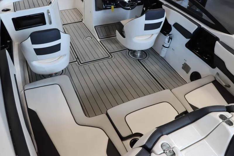 Slide: The Image of 2025 Yamaha Boats 195S interior with sleek seating and modern design. - 8