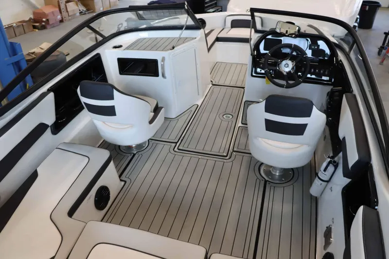 Slide: The Image of 2025 Yamaha Boats 195S interior with sleek seating and modern dashboard design. - 9