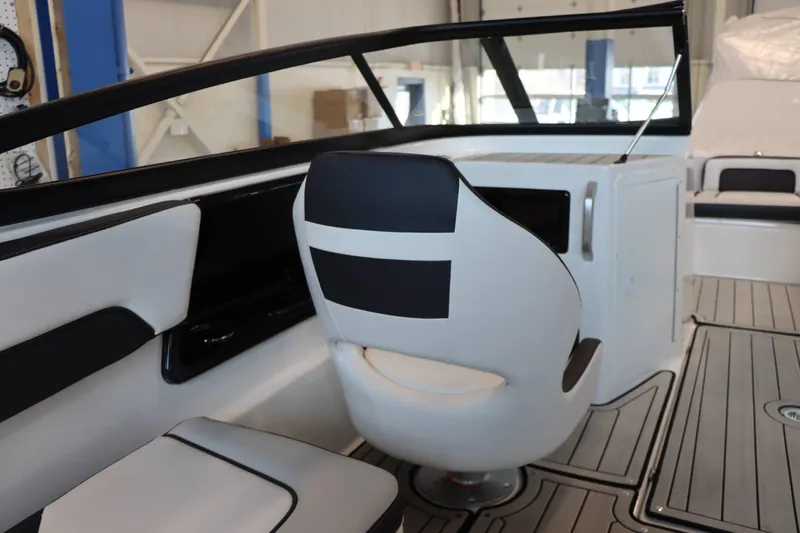 Slide: The Image of 2025 Yamaha Boats 195S interior with sleek seating and modern design. - 12