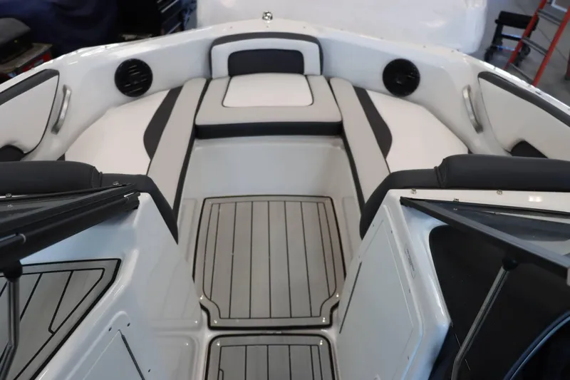 Slide: The Image of 2025 Yamaha Boats 195S interior with sleek seating and modern design. - 14