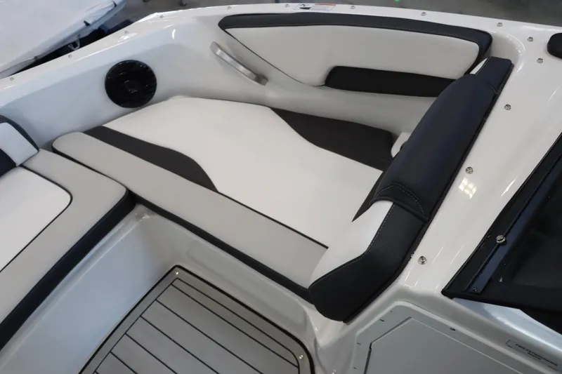 Slide: The Image of 2025 Yamaha Boats 195S interior seating with sleek black and white design. - 19