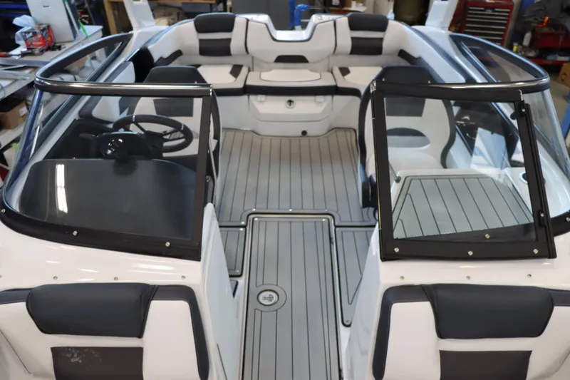 Slide: The Image of 2025 Yamaha Boats 195S interior with sleek seating and modern design. - 22