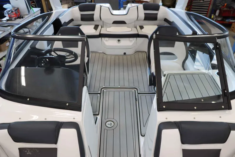 Slide: The Image of 2025 Yamaha Boats 195S interior with sleek seating and modern design. - 24