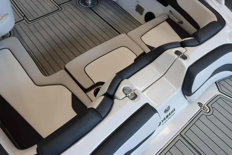 Slide: The Image of 2025 Yamaha Boats 195S interior seating with sleek design and modern upholstery. - 6