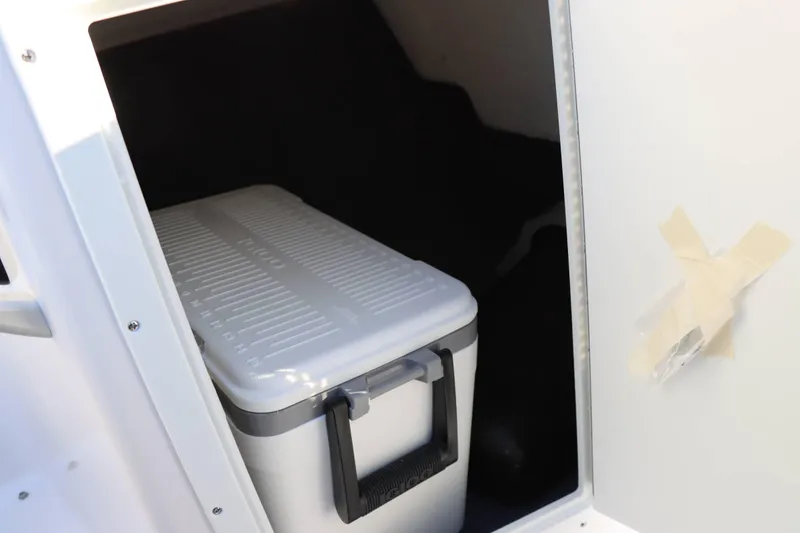 Slide: The Image of Storage compartment with cooler in 2025 Yamaha Boats 195S. - 12