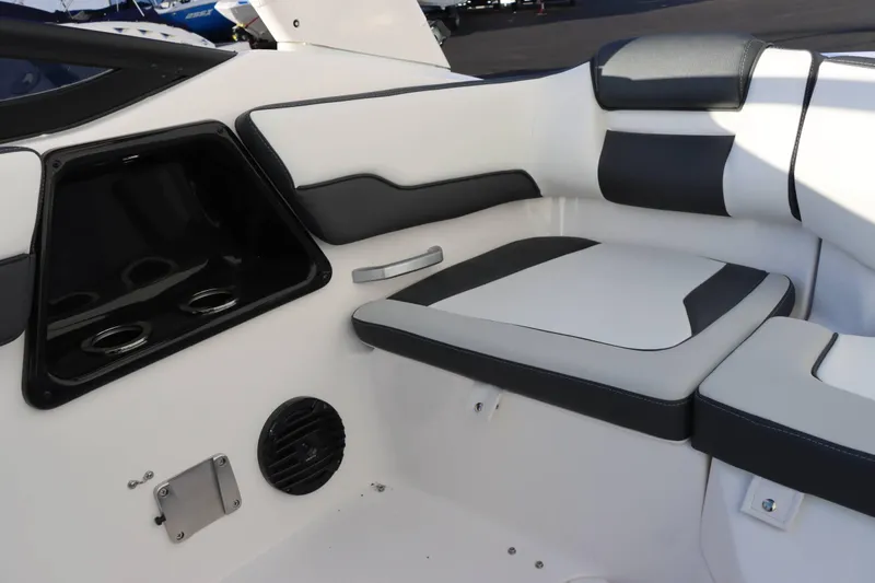 Slide: The Image of Interior seating of 2025 Yamaha Boats 195S, featuring sleek white and black design. - 19