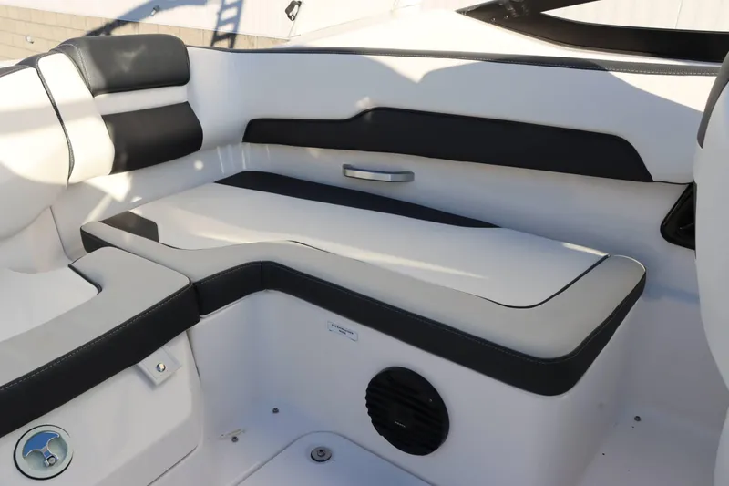 Slide: The Image of 2025 Yamaha Boats 195S interior seating with sleek black and white design. - 20
