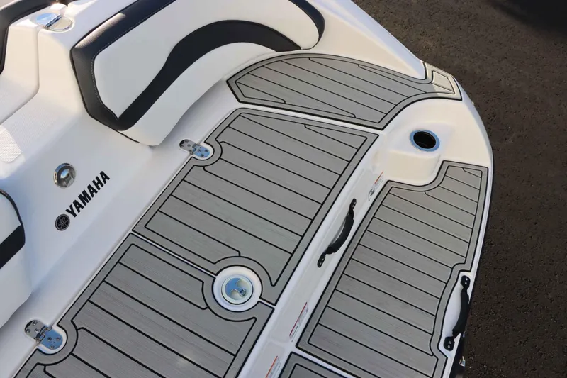 Slide: The Image of 2025 Yamaha Boats 195S deck with sleek seating and modern design. - 6