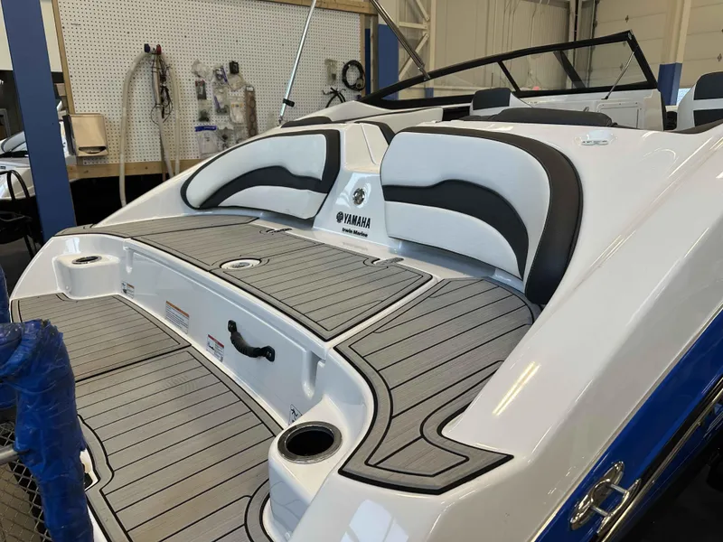 Slide: The Image of 2025 Yamaha Boats SX195 interior with sleek seating and modern design. - 3