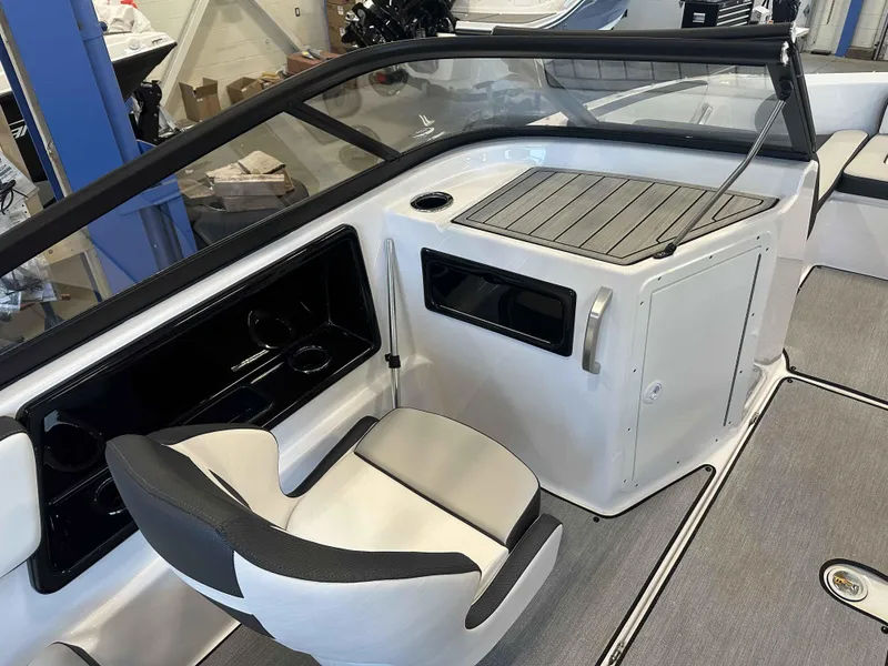Slide: The Image of 2025 Yamaha Boats SX195 interior with seating and storage, featuring sleek design and modern amenities. - 6