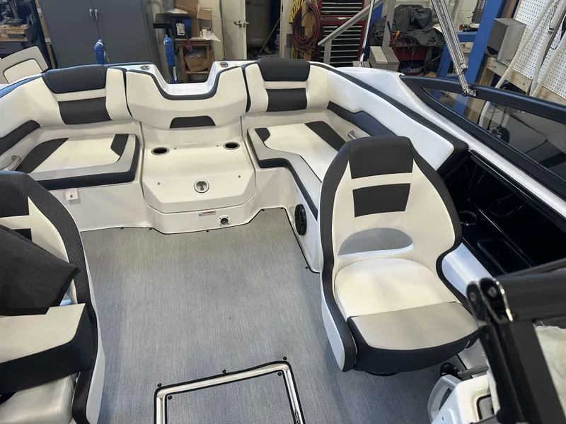 Slide: The Image of 2025 Yamaha Boats SX195 interior with sleek seating and modern design. - 7