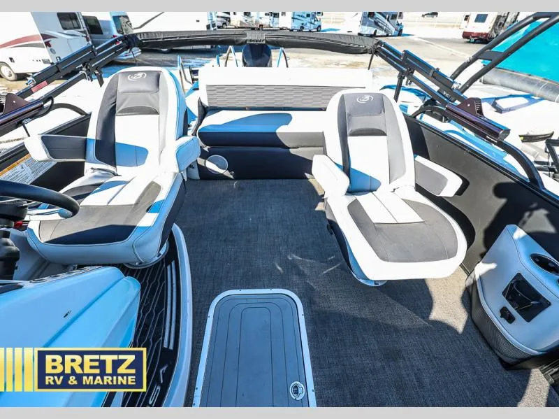 Slide: The Image of Interior of 2023 CORSA 23UC boat with modern seating and carpeted flooring. - 15