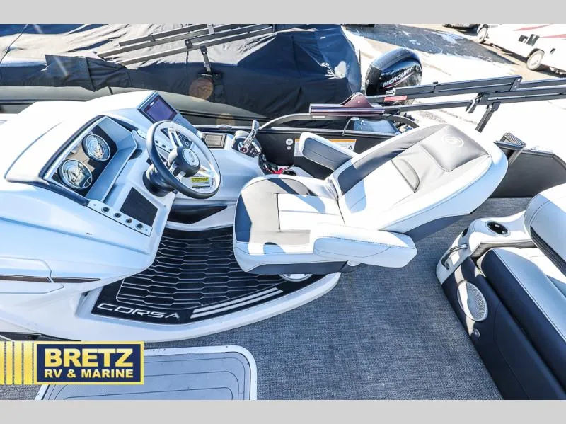 Slide: The Image of Captain's seat and dashboard of 2023 CORSA 23UC boat at Bretz RV & Marine. - 17