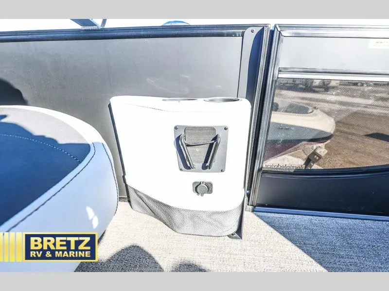 Slide: The Image of Interior of 2023 CORSA 23UC boat with cup holder and storage compartment. - 20