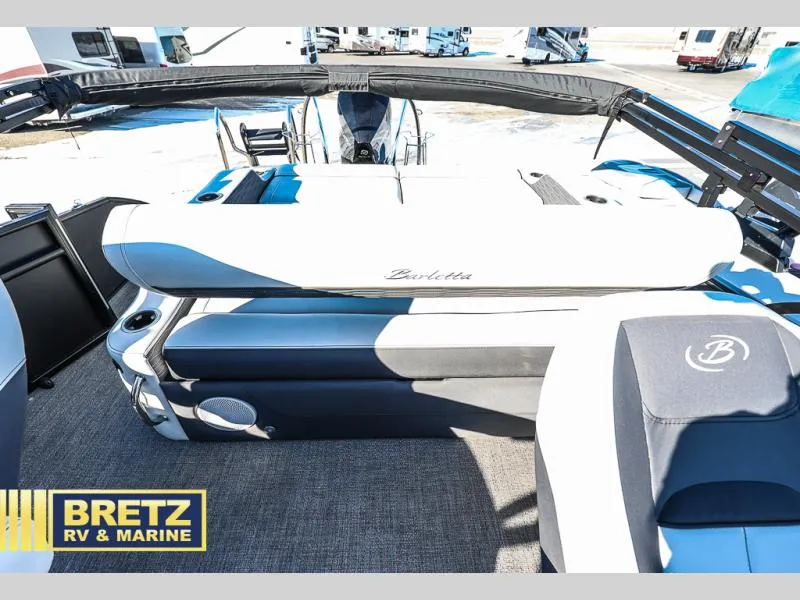 Slide: The Image of 2023 CORSA 23UC boat interior with seating, Bretz RV & Marine branding. - 21