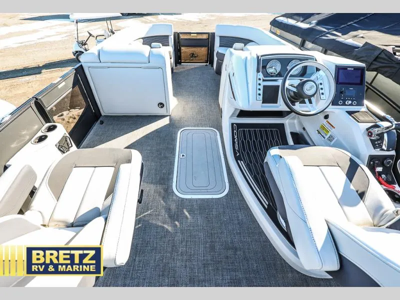 Slide: The Image of Interior of 2023 CORSA 23UC boat with modern seating and steering console. - 25