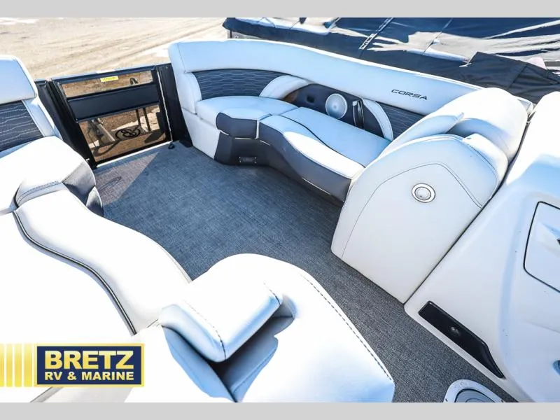 Slide: The Image of 2023 CORSA 23UC boat interior with plush seating, showcased by Bretz RV & Marine. - 28