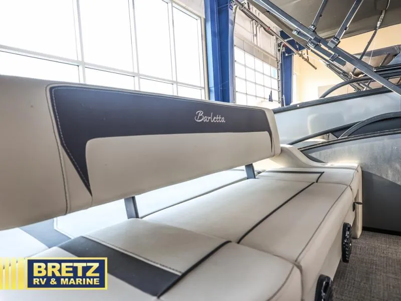 Slide: The Image of 2024 Aria Ultra-Lounge A24UC boat interior at Bretz RV & Marine showroom. - 15