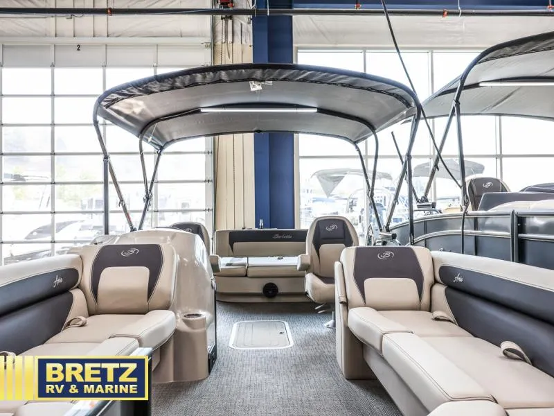 Slide: The Image of 2024 Aria Ultra-Lounge A24UC pontoon boat interior at Bretz RV & Marine showroom. - 9