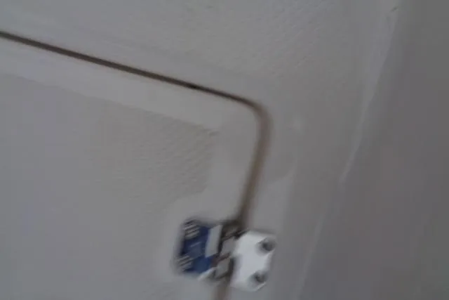 Slide: The Image of Hinged compartment door on 2025 Robalo R202 Explorer boat. - 29