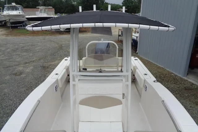 Slide: The Image of 2025 Robalo R202 Explorer boat with T-top, white interior, and spacious deck. - 35