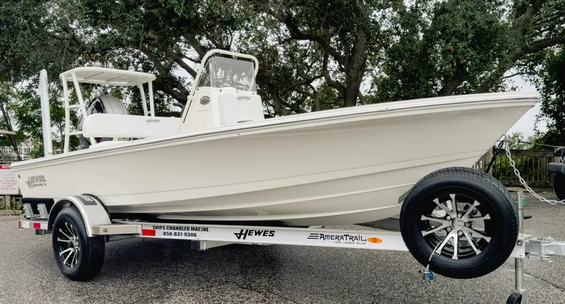 The Image of 2025 Hewes 16 Redfisher boat on trailer, parked outdoors. - 0