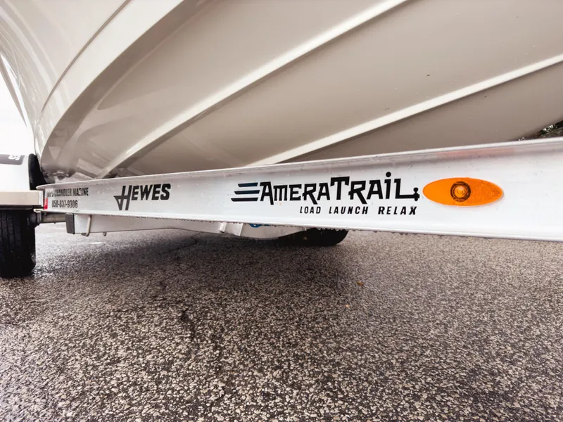 Slide: The Image of 2025 Hewes 16 Redfisher boat on AmeraTrail trailer, close-up view. - 4