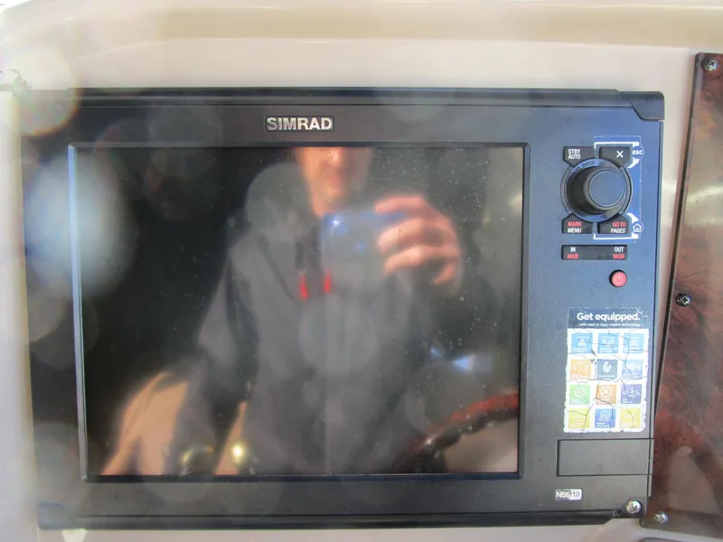 Slide: The Image of Simrad navigation system on 2001 Sea Ray 340 Amberjack boat. - 12