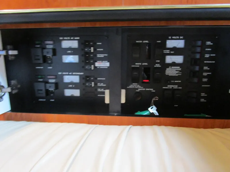 Slide: The Image of Electrical control panel on 2001 Sea Ray 340 Amberjack boat. - 24