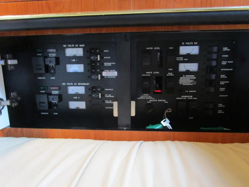 Slide: The Image of Electrical control panel on a 2001 Sea Ray 340 Amberjack boat. - 25