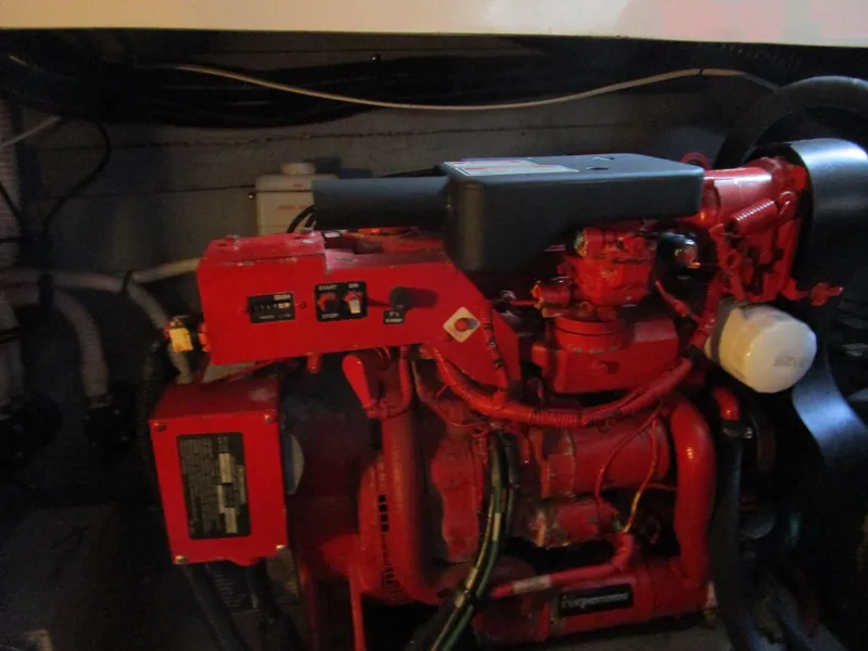Slide: The Image of Engine compartment of a 2001 Sea Ray 340 Amberjack boat. - 27