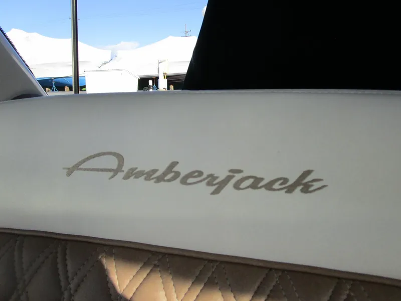 Slide: The Image of Close-up of 2001 Sea Ray 340 Amberjack interior with "Amberjack" logo. - 8