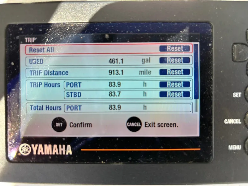 Slide: The Image of Yamaha display showing trip data: 461.1 gallons used, 913.1 miles traveled, 83.9 hours logged. - 13