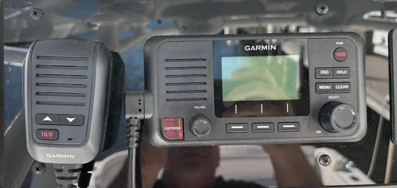 Slide: The Image of Garmin marine radio system on 2020 Sea Hunt Ultra 275 SE boat dashboard. - 15