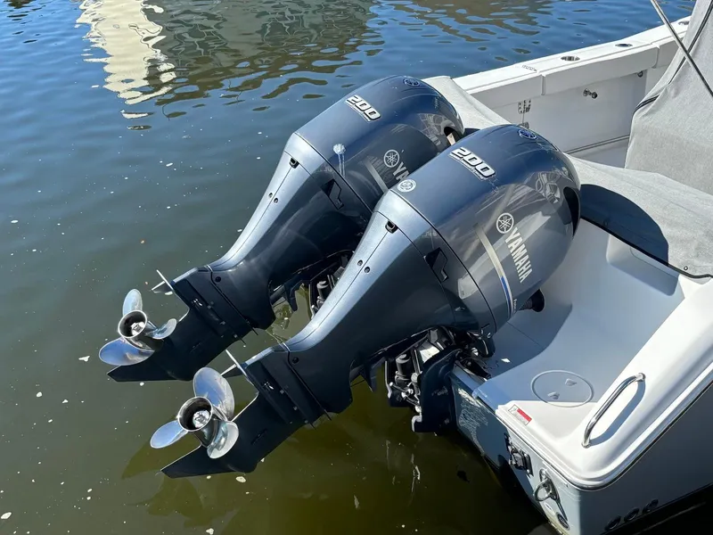 Slide: The Image of Twin Yamaha outboard motors on a 2020 Sea Hunt Ultra 275 SE boat. - 27