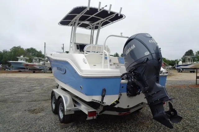 Slide: The Image of 2025 Robalo R200 Center Console boat with Yamaha engine on trailer. - 18