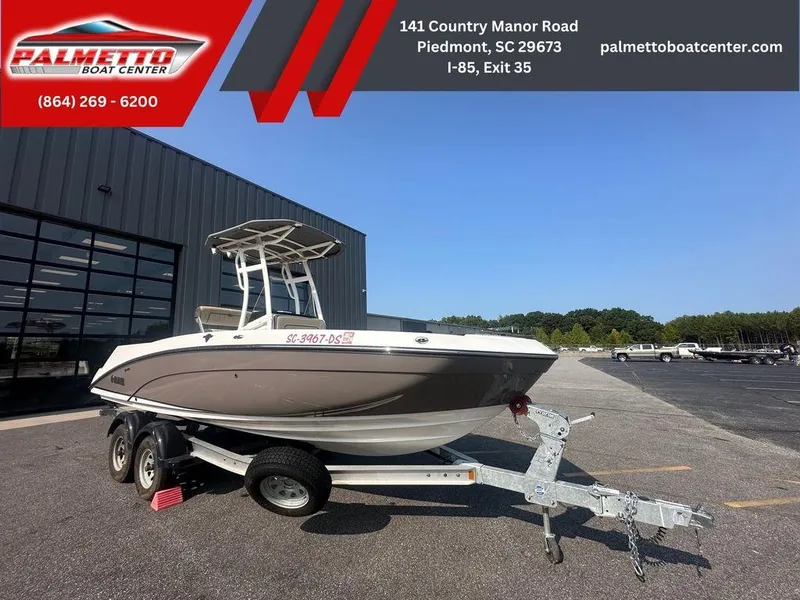 Slide: The Image of 2022 Yamaha Boats 210 FSH® SPORT on trailer at Palmetto Boat Center. - 2
